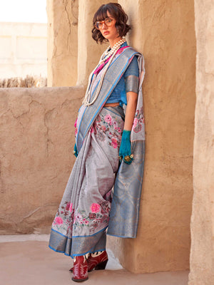 This Steel Blue–Blush Pink FeatherSoft saree features stunning printed floral work with floral detailing and grid textures, ideal for festive evenings and cocktail-ready styling. Designed for lightweight elegance and statement draping. SKU 376003. This Steel Blue–Blush Pink FeatherSoft saree features stunning printed floral work with floral detailing and grid textures, ideal for festive evenings and cocktail-ready styling. Designed for lightweight elegance and statement draping. SKU 376003.