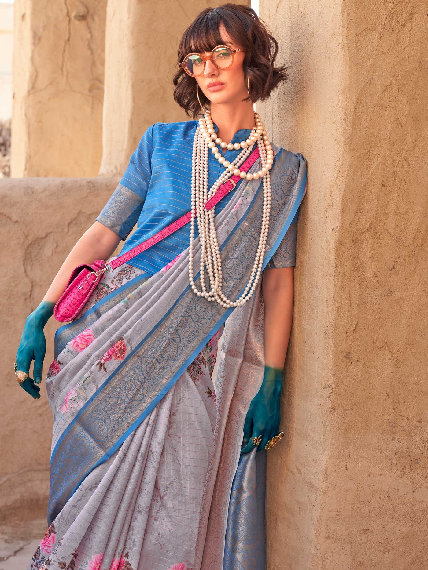 This Steel Blue–Blush Pink FeatherSoft saree features stunning printed floral work with floral detailing and grid textures, ideal for festive evenings and cocktail-ready styling. Designed for lightweight elegance and statement draping. SKU 376003. This Steel Blue–Blush Pink FeatherSoft saree features stunning printed floral work with floral detailing and grid textures, ideal for festive evenings and cocktail-ready styling. Designed for lightweight elegance and statement draping. SKU 376003.