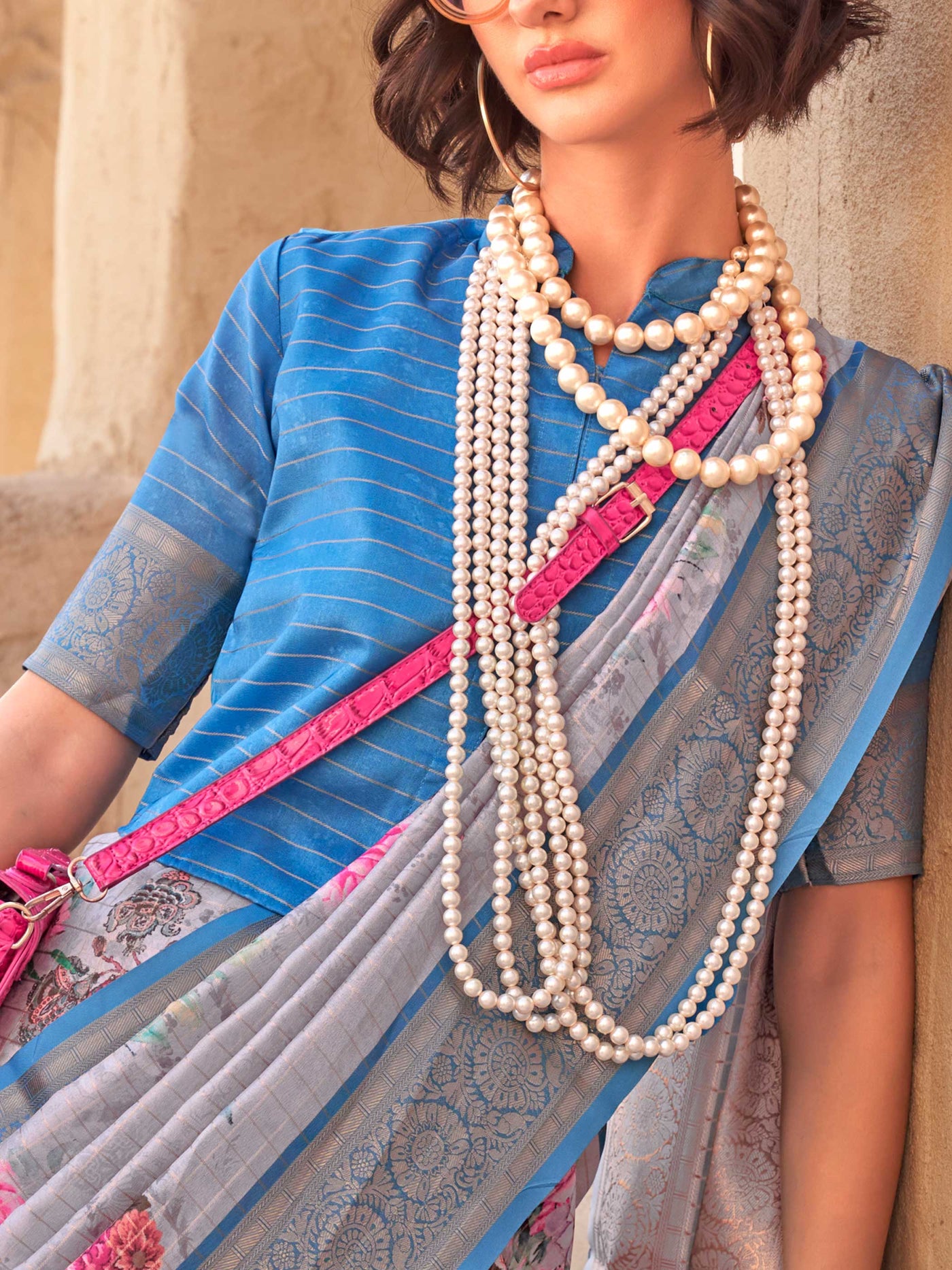 This Steel Blue–Blush Pink FeatherSoft saree features stunning printed floral work with floral detailing and grid textures, ideal for festive evenings and cocktail-ready styling. Designed for lightweight elegance and statement draping. SKU 376003. This Steel Blue–Blush Pink FeatherSoft saree features stunning printed floral work with floral detailing and grid textures, ideal for festive evenings and cocktail-ready styling. Designed for lightweight elegance and statement draping. SKU 376003.