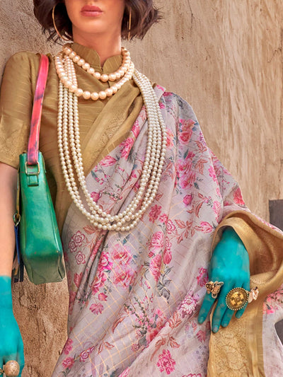 This Cream White–Gold FeatherSoft saree features stunning printed floral work with floral detailing and grid textures, ideal for festive evenings and cocktail-ready styling. Designed for lightweight elegance and statement draping. SKU 376005. This Cream White–Gold FeatherSoft saree features stunning printed floral work with floral detailing and grid textures, ideal for festive evenings and cocktail-ready styling. Designed for lightweight elegance and statement draping. SKU 376005.