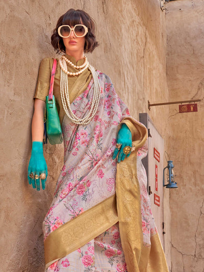 This Cream White–Gold FeatherSoft saree features stunning printed floral work with floral detailing and grid textures, ideal for festive evenings and cocktail-ready styling. Designed for lightweight elegance and statement draping. SKU 376005. This Cream White–Gold FeatherSoft saree features stunning printed floral work with floral detailing and grid textures, ideal for festive evenings and cocktail-ready styling. Designed for lightweight elegance and statement draping. SKU 376005.