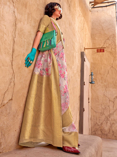 This Cream White–Gold FeatherSoft saree features stunning printed floral work with floral detailing and grid textures, ideal for festive evenings and cocktail-ready styling. Designed for lightweight elegance and statement draping. SKU 376005. This Cream White–Gold FeatherSoft saree features stunning printed floral work with floral detailing and grid textures, ideal for festive evenings and cocktail-ready styling. Designed for lightweight elegance and statement draping. SKU 376005.