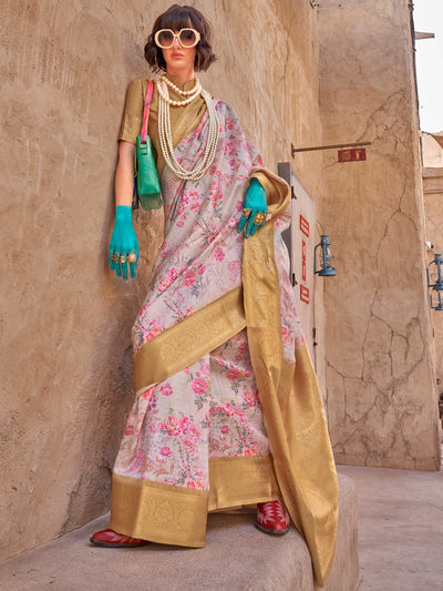 This Cream White–Gold FeatherSoft saree features stunning printed floral work with floral detailing and grid textures, ideal for festive evenings and cocktail-ready styling. Designed for lightweight elegance and statement draping. SKU 376005. This Cream White–Gold FeatherSoft saree features stunning printed floral work with floral detailing and grid textures, ideal for festive evenings and cocktail-ready styling. Designed for lightweight elegance and statement draping. SKU 376005.