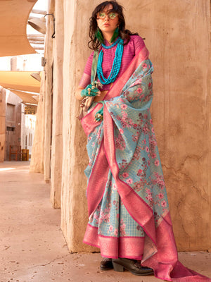This Sky Blue–Magenta FeatherSoft saree features stunning printed floral work with floral detailing and grid textures, ideal for festive evenings and cocktail-ready styling. Designed for lightweight elegance and statement draping. SKU 376006. This Sky Blue–Magenta FeatherSoft saree features stunning printed floral work with floral detailing and grid textures, ideal for festive evenings and cocktail-ready styling. Designed for lightweight elegance and statement draping. SKU 376006.