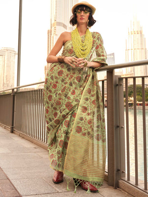Olive Green and Mustard zari tissue saree with printed floral motifs and zari pallu This image captures the front drape view highlighting pallu fall and pleats alignment, ideal for visualizing festive elegance, designer appeal, and modern styling inspiration. Perfect for online shoppers seeking detailed previews before purchase, enhancing saree visual merchandising and SEO-rich product display strategy.                                                                                                          