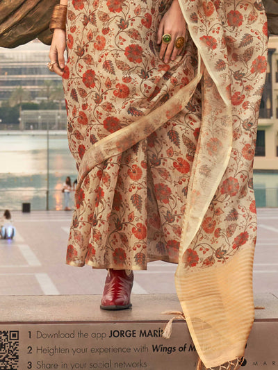 Beige and Golden zari tissue saree with printed floral motifs and zari pallu This image captures the back drape focus revealing pallu finesse and motif richness, ideal for visualizing festive elegance, designer appeal, and modern styling inspiration. Perfect for online shoppers seeking detailed previews before purchase, enhancing saree visual merchandising and SEO-rich product display strategy.                                                                                                                   
