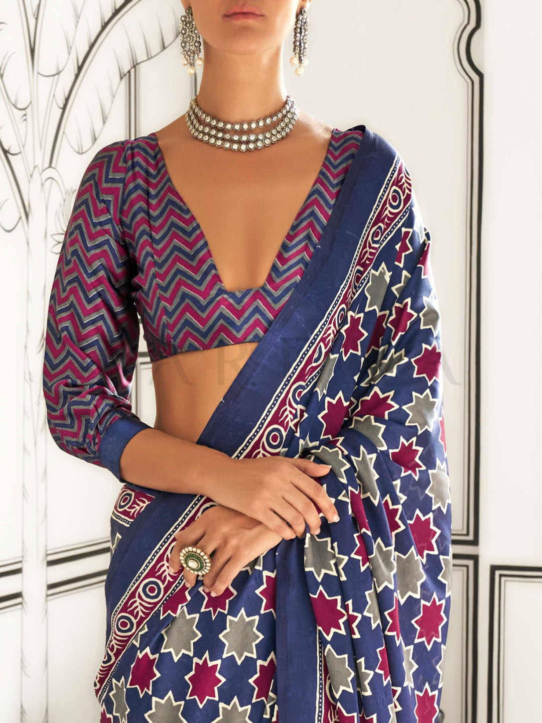Navy Blue and Red-Ivory satin crepe saree with ajrakh digital print, soft texture and festive drape This image captures the zoomed texture view illustrating fabric weave and print clarity, ideal for visualizing festive elegance, designer appeal, and modern styling inspiration. Perfect for online shoppers seeking detailed previews before purchase, enhancing saree visual merchandising and SEO-rich product display strategy.                                                                                        