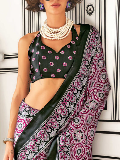 Black and Pink-White satin crepe saree with ajrakh digital print, soft texture and festive drape This image captures the zoomed texture view illustrating fabric weave and print clarity, ideal for visualizing festive elegance, designer appeal, and modern styling inspiration. Perfect for online shoppers seeking detailed previews before purchase, enhancing saree visual merchandising and SEO-rich product display strategy.                                                                                           