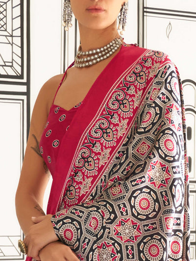 Red and Black-White satin crepe saree with ajrakh digital print, soft texture and festive drape This image captures the zoomed texture view illustrating fabric weave and print clarity, ideal for visualizing festive elegance, designer appeal, and modern styling inspiration. Perfect for online shoppers seeking detailed previews before purchase, enhancing saree visual merchandising and SEO-rich product display strategy.                                                                                            