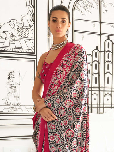 Red and Black-White satin crepe saree with ajrakh digital print, soft texture and festive drape This image captures the side angle view showcasing blouse styling and zari border detail, ideal for visualizing festive elegance, designer appeal, and modern styling inspiration. Perfect for online shoppers seeking detailed previews before purchase, enhancing saree visual merchandising and SEO-rich product display strategy.                                                                                           