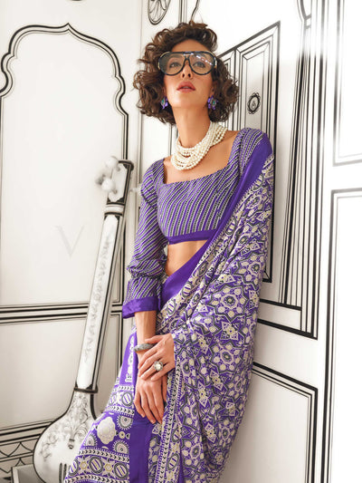 Purple and Silver satin crepe saree with ajrakh digital print, soft texture and festive drape This image captures the model styling perspective with complete saree ensemble displayed, ideal for visualizing festive elegance, designer appeal, and modern styling inspiration. Perfect for online shoppers seeking detailed previews before purchase, enhancing saree visual merchandising and SEO-rich product display strategy.                                                                                             