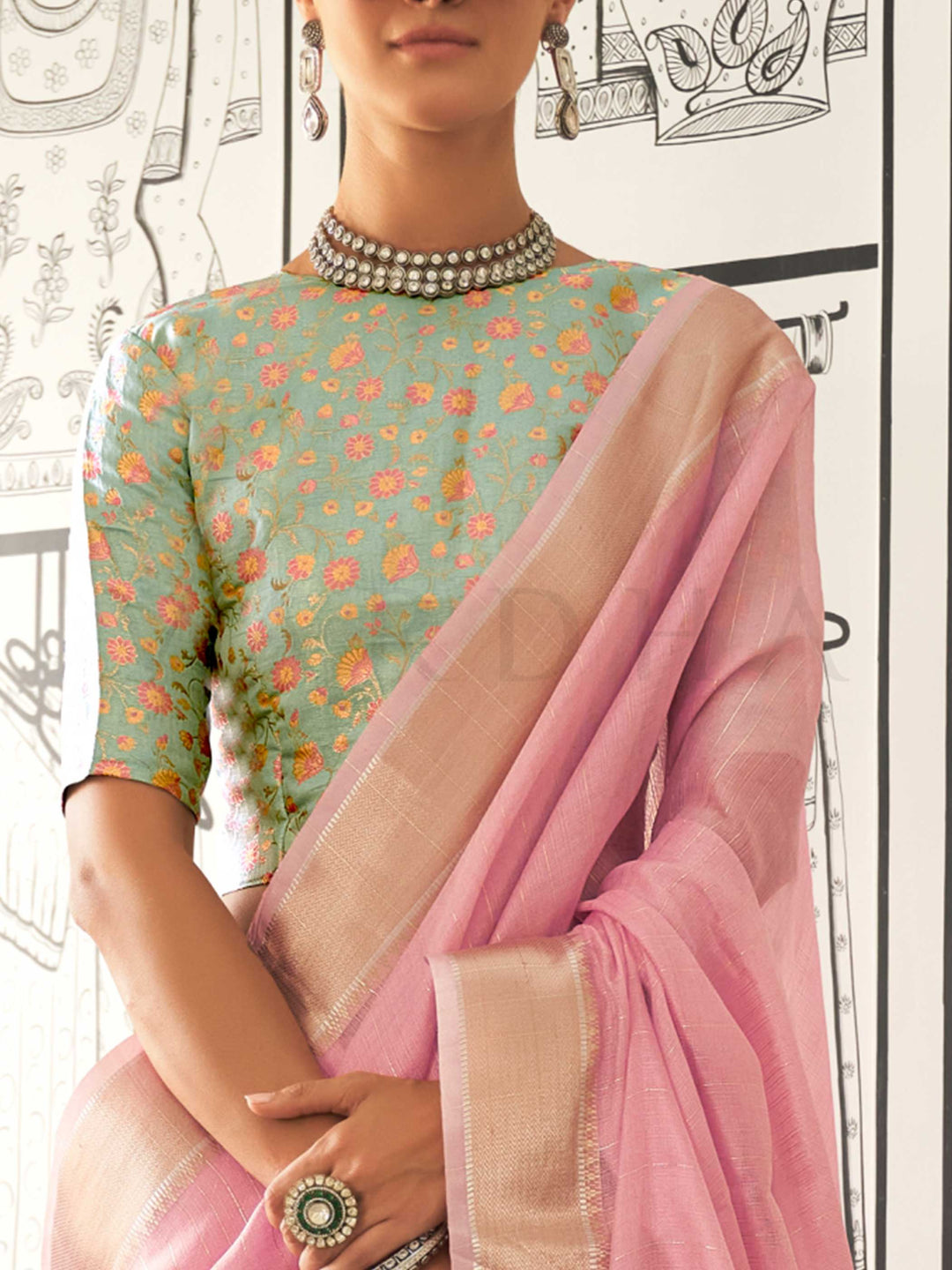 Pastel Pink moss chiffon saree styled for front profile This image captures the zoomed texture view illustrating fabric weave and print clarity, ideal for visualizing festive elegance, designer appeal, and modern styling inspiration. Perfect for online shoppers seeking detailed previews before purchase, enhancing saree visual merchandising and SEO-rich product display strategy.                                                                                                                                    