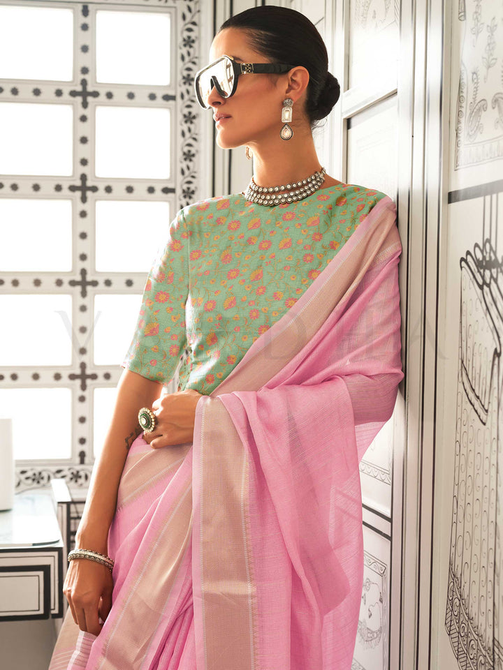 Pastel Pink moss chiffon saree styled for front profile This image captures the model styling perspective with complete saree ensemble displayed, ideal for visualizing festive elegance, designer appeal, and modern styling inspiration. Perfect for online shoppers seeking detailed previews before purchase, enhancing saree visual merchandising and SEO-rich product display strategy.                                                                                                                                   