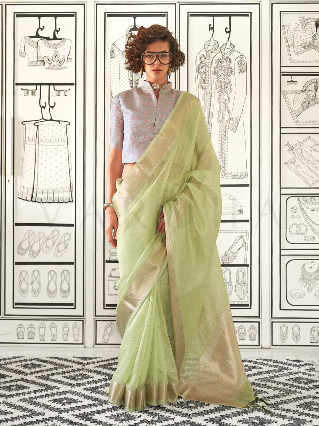 Pista Green moss chiffon saree styled for front profile This image captures the front drape view highlighting pallu fall and pleats alignment, ideal for visualizing festive elegance, designer appeal, and modern styling inspiration. Perfect for online shoppers seeking detailed previews before purchase, enhancing saree visual merchandising and SEO-rich product display strategy.                                                                                                                                      
