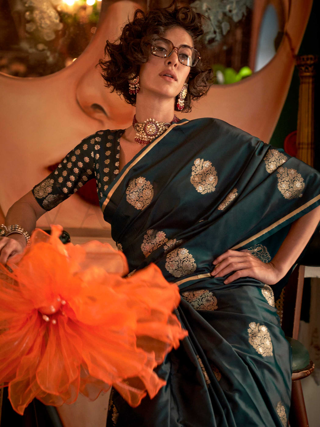 Rich zari motif silk saree in handloom satin fabric, styled with ethnic blouse – elegant ethnic wear This image captures the model styling perspective with complete saree ensemble displayed, ideal for visualizing festive elegance, designer appeal, and modern styling inspiration. Perfect for online shoppers seeking detailed previews before purchase, enhancing saree visual merchandising and SEO-rich product display strategy.                                                                                      
