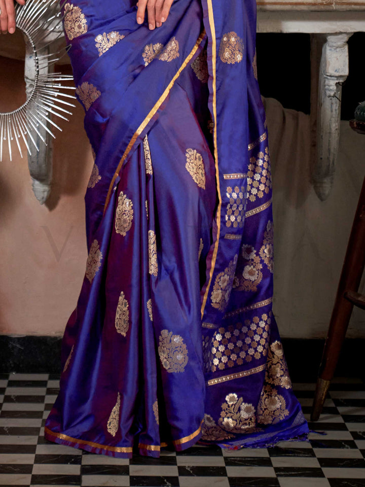 Royal Blue satin handloom silk saree with intricate brocade pallu, perfect for weddings and festive occasions This image captures the back drape focus revealing pallu finesse and motif richness, ideal for visualizing festive elegance, designer appeal, and modern styling inspiration. Perfect for online shoppers seeking detailed previews before purchase, enhancing saree visual merchandising and SEO-rich product display strategy.                                                                                  