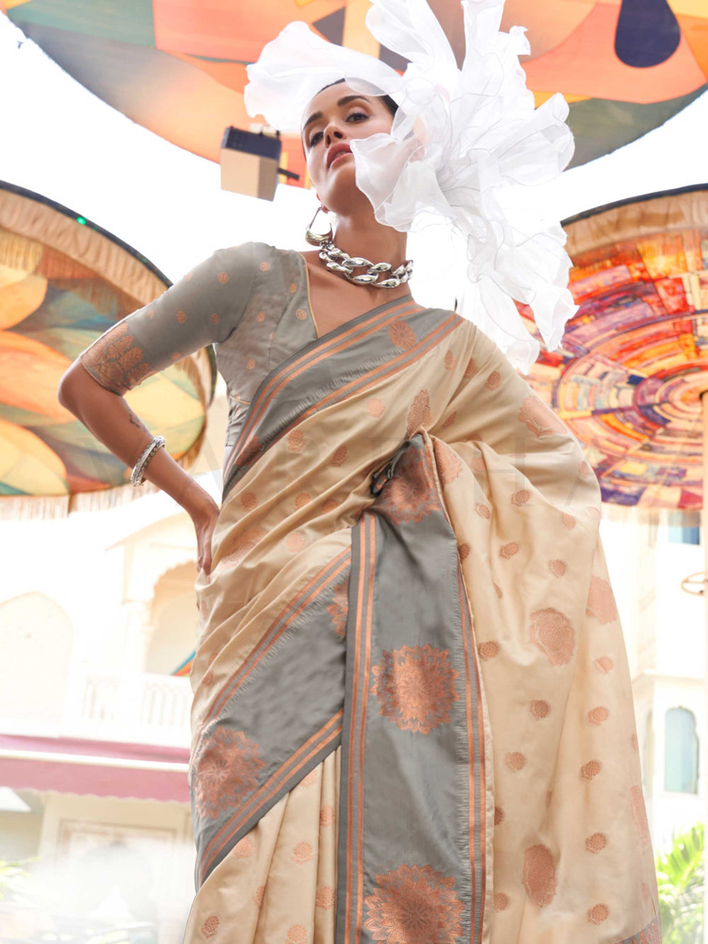 Elegant Ivory–Slate Grey silk saree with jacquard weave and mandala inspired border detailing. Ivory–Slate Grey saree for weddings and sangeet, finished with artistic zari craftsmanship and rich drape.