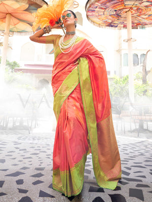 Sunset Coral–Pista Green satin silk saree featuring woven zari mandala motifs, contrast pallu and elegant festive finish. Festive Sunset Coral–Pista Green saree in soft satin silk with intricate weaving and a graceful two-tone blend.