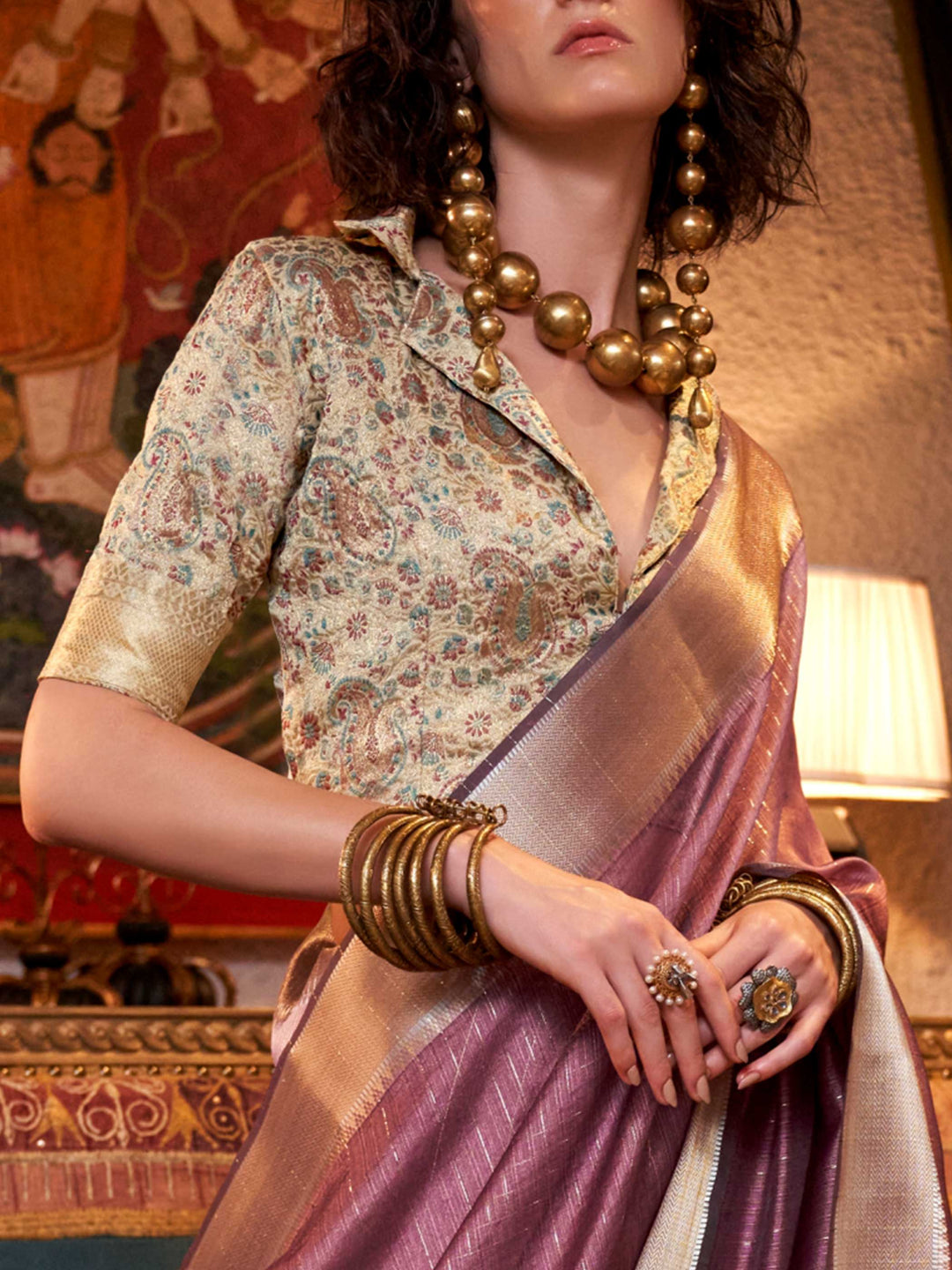 Soft Mauve chiffon saree with Champagne pallu and zari accents This image captures the zoomed texture view illustrating fabric weave and print clarity, ideal for visualizing festive elegance, designer appeal, and modern styling inspiration. Perfect for online shoppers seeking detailed previews before purchase, enhancing saree visual merchandising and SEO-rich product display strategy.                                                                                                                             