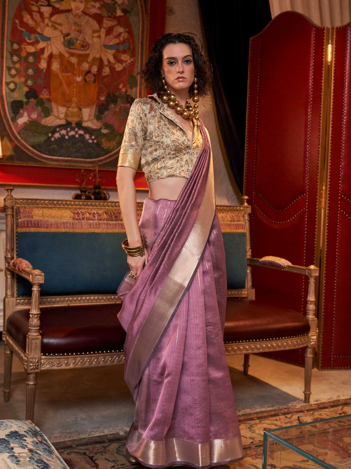 Soft Mauve chiffon saree with Champagne pallu and zari accents This image captures the model styling perspective with complete saree ensemble displayed, ideal for visualizing festive elegance, designer appeal, and modern styling inspiration. Perfect for online shoppers seeking detailed previews before purchase, enhancing saree visual merchandising and SEO-rich product display strategy.                                                                                                                            