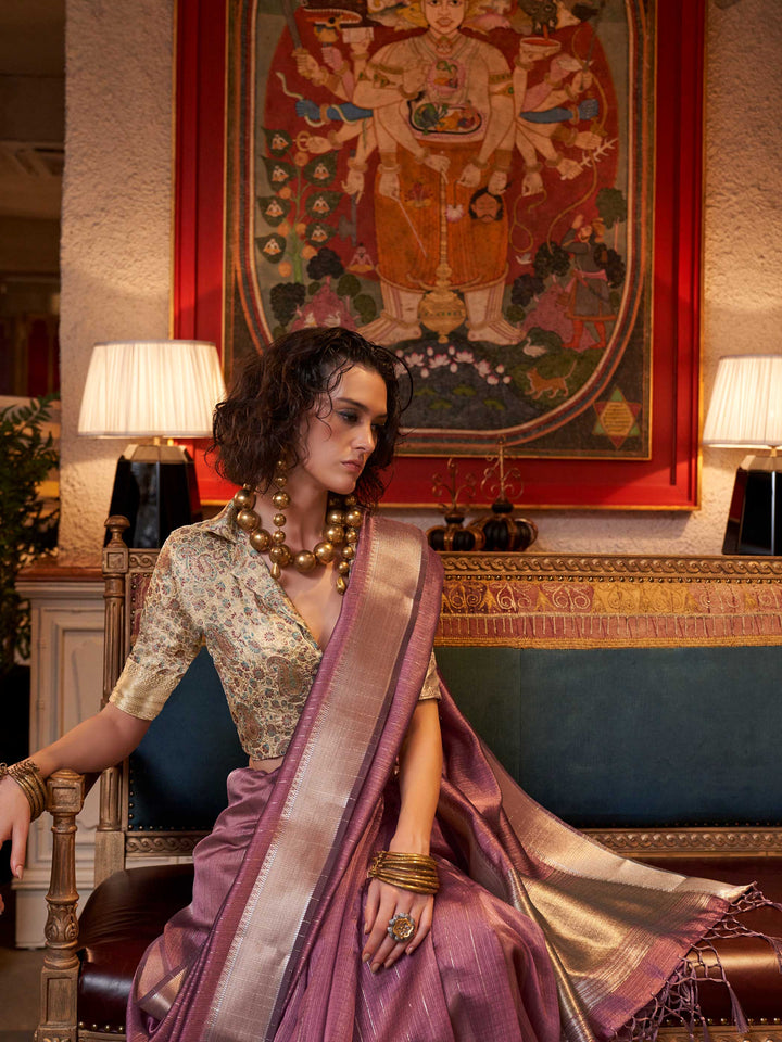 Soft Mauve chiffon saree with Champagne pallu and zari accents This image captures the pleats close-up showing symmetry, color blending, and craftsmanship, ideal for visualizing festive elegance, designer appeal, and modern styling inspiration. Perfect for online shoppers seeking detailed previews before purchase, enhancing saree visual merchandising and SEO-rich product display strategy.                                                                                                                         