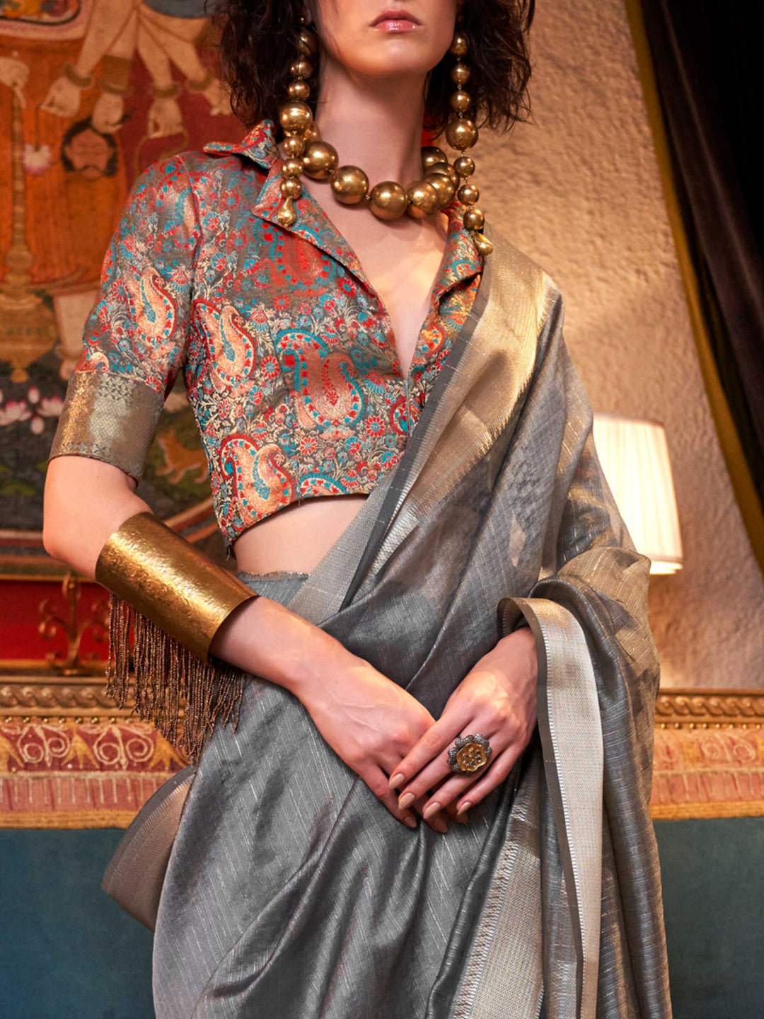 Soft Silver Grey chiffon saree with Platinum pallu and zari accents This image captures the zoomed texture view illustrating fabric weave and print clarity, ideal for visualizing festive elegance, designer appeal, and modern styling inspiration. Perfect for online shoppers seeking detailed previews before purchase, enhancing saree visual merchandising and SEO-rich product display strategy.                                                                                                                        