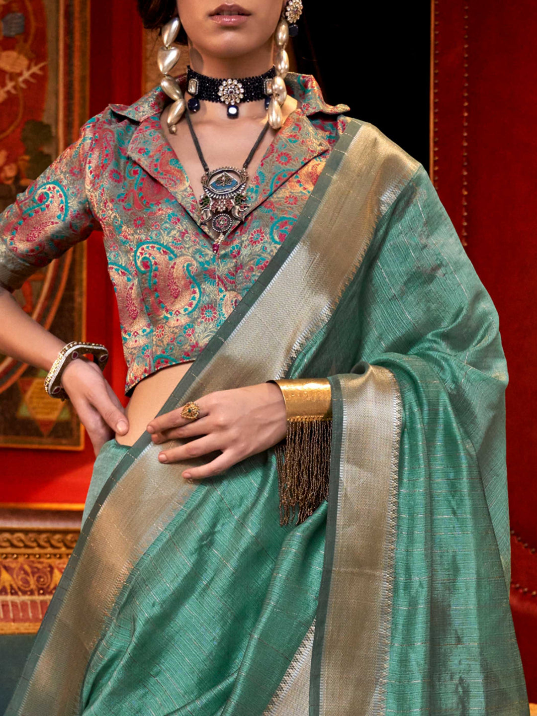 Soft Mint Green chiffon saree with Silver pallu and zari accents This image captures the zoomed texture view illustrating fabric weave and print clarity, ideal for visualizing festive elegance, designer appeal, and modern styling inspiration. Perfect for online shoppers seeking detailed previews before purchase, enhancing saree visual merchandising and SEO-rich product display strategy.                                                                                                                           