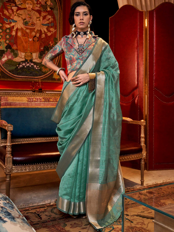 Soft Mint Green chiffon saree with Silver pallu and zari accents This image captures the front drape view highlighting pallu fall and pleats alignment, ideal for visualizing festive elegance, designer appeal, and modern styling inspiration. Perfect for online shoppers seeking detailed previews before purchase, enhancing saree visual merchandising and SEO-rich product display strategy.                                                                                                                             