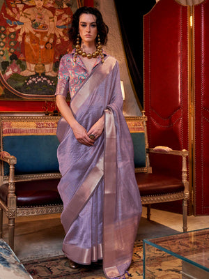 Soft Lavender chiffon saree with Ivory pallu and zari accents This image captures the front drape view highlighting pallu fall and pleats alignment, ideal for visualizing festive elegance, designer appeal, and modern styling inspiration. Perfect for online shoppers seeking detailed previews before purchase, enhancing saree visual merchandising and SEO-rich product display strategy.                                                                                                                                