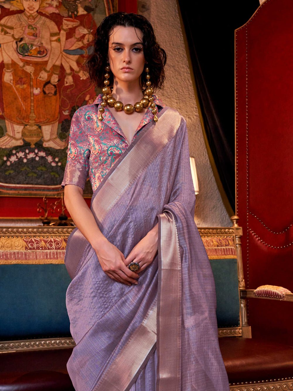Soft Lavender chiffon saree with Ivory pallu and zari accents This image captures the side angle view showcasing blouse styling and zari border detail, ideal for visualizing festive elegance, designer appeal, and modern styling inspiration. Perfect for online shoppers seeking detailed previews before purchase, enhancing saree visual merchandising and SEO-rich product display strategy.                                                                                                                             