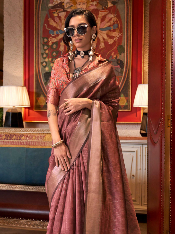 Soft Dusty Rose chiffon saree with Taupe pallu and zari accents This image captures the side angle view showcasing blouse styling and zari border detail, ideal for visualizing festive elegance, designer appeal, and modern styling inspiration. Perfect for online shoppers seeking detailed previews before purchase, enhancing saree visual merchandising and SEO-rich product display strategy.                                                                                                                           