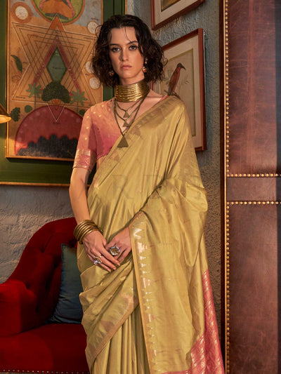 Pistachio Green–Rose Pink feathersoft raw silk saree featuring banarasi ikat design, ideal for sangeet night and festive evening wear with rich texture and contrast blouse. Pistachio Green–Rose Pink feathersoft raw silk saree featuring banarasi ikat design, ideal for sangeet night and festive evening wear with rich texture and contrast blouse..