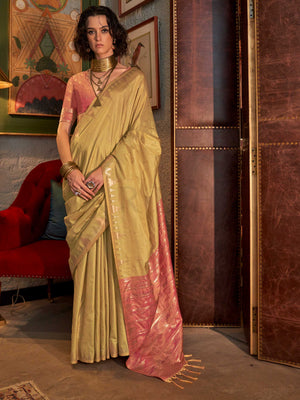 Pistachio Green–Rose Pink feathersoft raw silk saree featuring banarasi ikat design, ideal for sangeet night and festive evening wear with rich texture and contrast blouse. Pistachio Green–Rose Pink feathersoft raw silk saree featuring banarasi ikat design, ideal for sangeet night and festive evening wear with rich texture and contrast blouse..