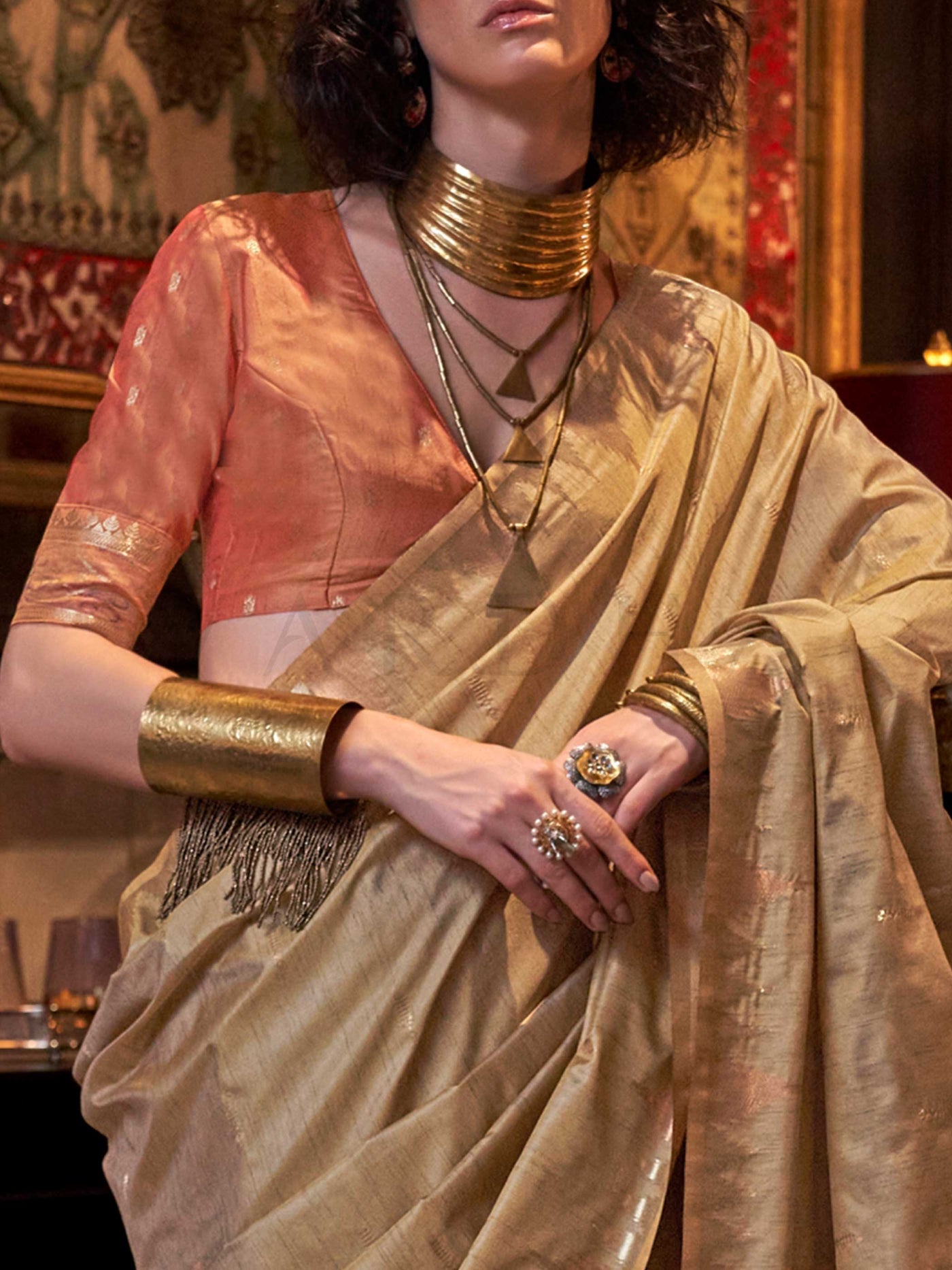 Beige Gold–Rust Copper feathersoft raw silk saree featuring banarasi ikat design, ideal for sangeet night and festive evening wear with rich texture and contrast blouse. Beige Gold–Rust Copper feathersoft raw silk saree featuring banarasi ikat design, ideal for sangeet night and festive evening wear with rich texture and contrast blouse..
