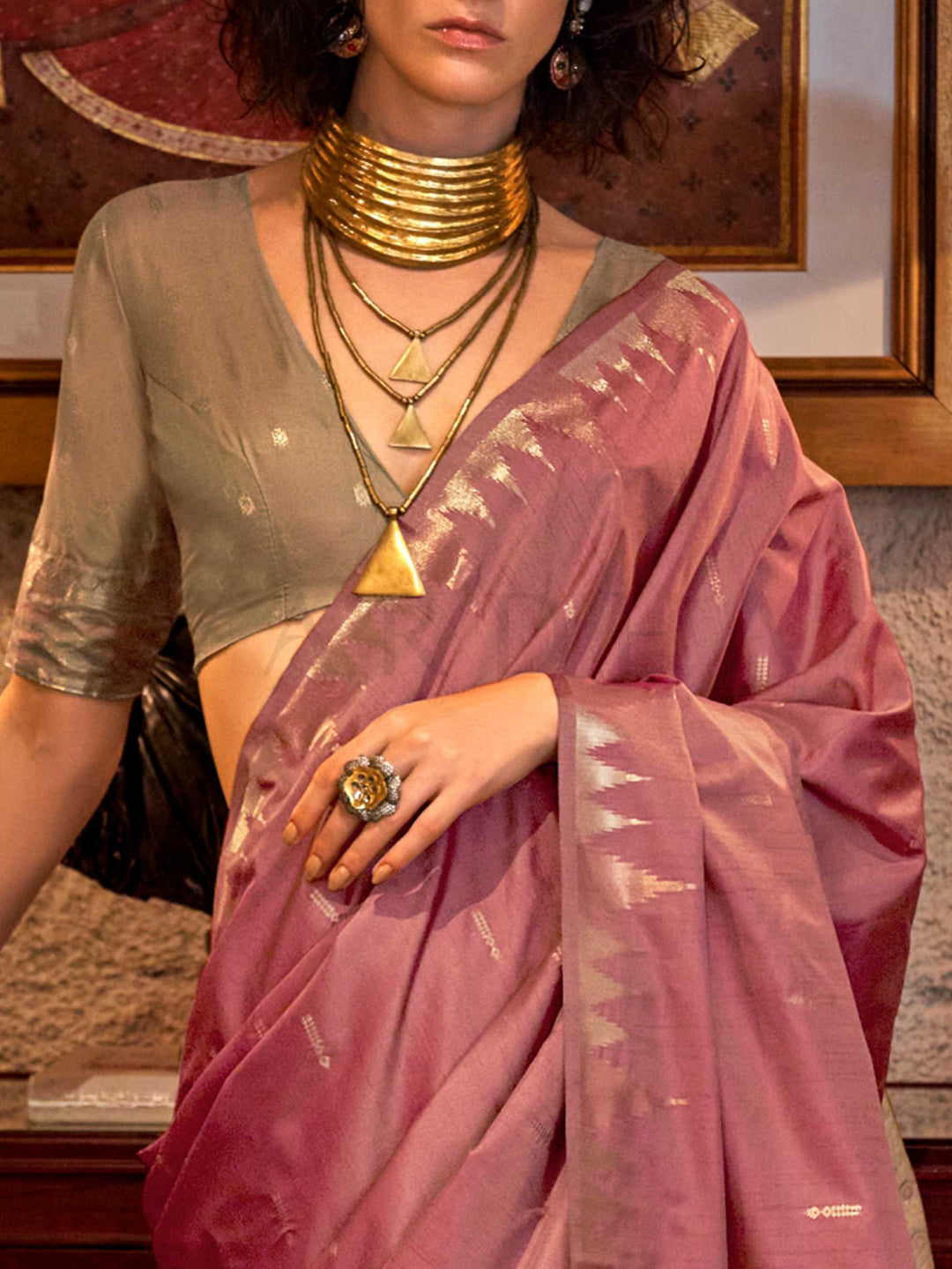 Dusty Rose–Pale Gold feathersoft raw silk saree featuring banarasi ikat design, ideal for sangeet night and festive evening wear with rich texture and contrast blouse. Dusty Rose–Pale Gold feathersoft raw silk saree featuring banarasi ikat design, ideal for sangeet night and festive evening wear with rich texture and contrast blouse..
