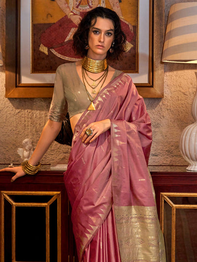 Dusty Rose–Pale Gold feathersoft raw silk saree featuring banarasi ikat design, ideal for sangeet night and festive evening wear with rich texture and contrast blouse. Dusty Rose–Pale Gold feathersoft raw silk saree featuring banarasi ikat design, ideal for sangeet night and festive evening wear with rich texture and contrast blouse..