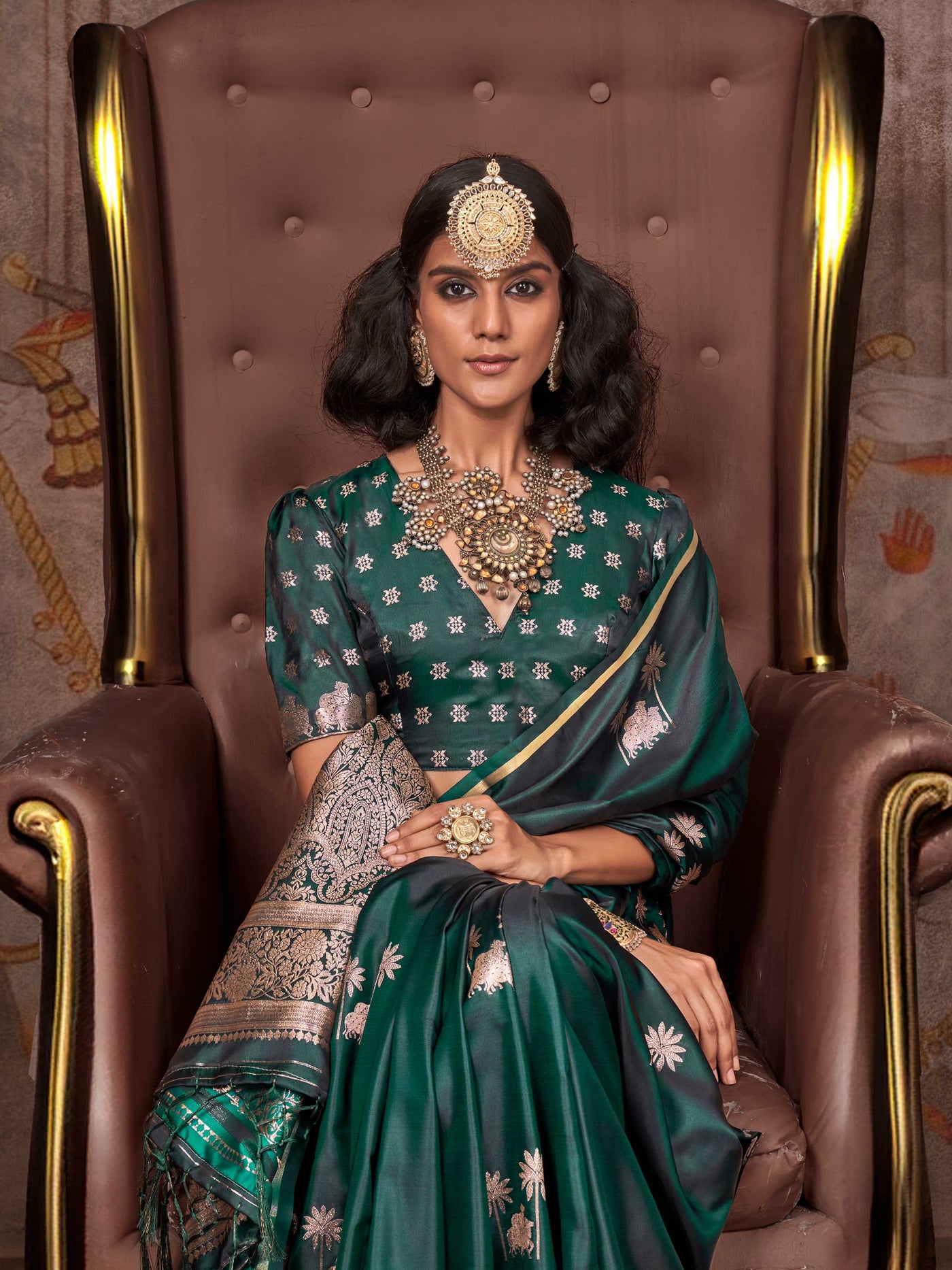 Bottle Green–Rose Gold satin silk saree with jacquard woven motifs and floral zari detailing. Perfect partywear or reception look with embroidered blouse and traditional drape, ideal for festive fashion styling. Bottle Green–Rose Gold satin silk saree with jacquard woven motifs and floral zari detailing. Perfect partywear or reception look with embroidered blouse and traditional drape, ideal for festive fashion styling..