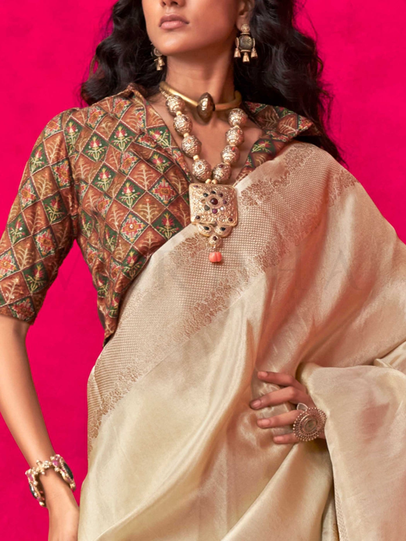 Ivory Beige–Ivory Zari tissue viscose silk saree with jacquard woven zari work, ideal for weddings, bridesmaids, and elegant evening events. Features tassel border and shimmering finish. Ivory Beige–Ivory Zari tissue viscose silk saree with jacquard woven zari work, ideal for weddings, bridesmaids, and elegant evening events. Features tassel border and shimmering finish..