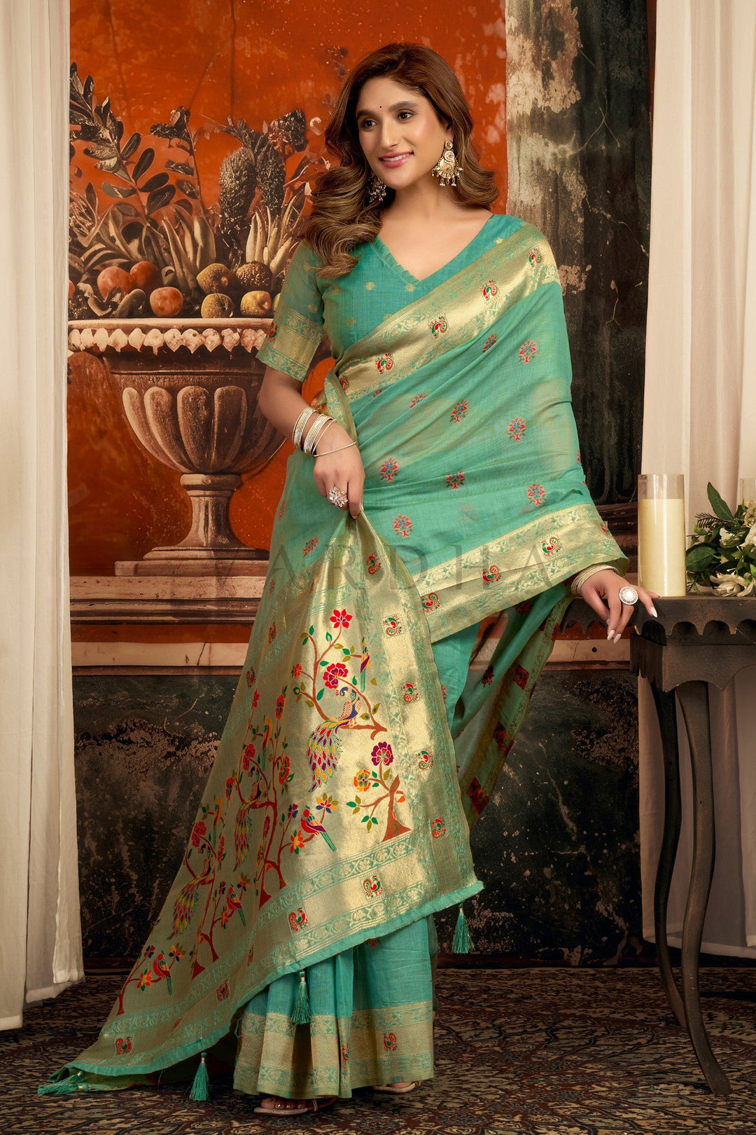Teal Green Tissue Paithani Saree with Zari Border &amp; Peacock Motifs