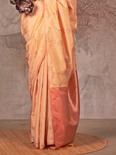 Buttermilk Yellow–Warm Peach two-tone satin silk saree with woven zari work, styled for bridal wedding ceremonies with jacquard pattern and contrast pallu elegance. Buttermilk Yellow–Warm Peach two-tone satin silk saree with woven zari work, styled for bridal wedding ceremonies with jacquard pattern and contrast pallu elegance..