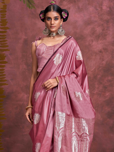 Blush Rose–Silver Mauve satin silk saree with intricate jacquard zari motifs and metallic pallu, styled for wedding reception and festive bridal evenings with sculpted blouse elegance. Blush Rose–Silver Mauve satin silk saree with intricate jacquard zari motifs and metallic pallu, styled for wedding reception and festive bridal evenings with sculpted blouse elegance..