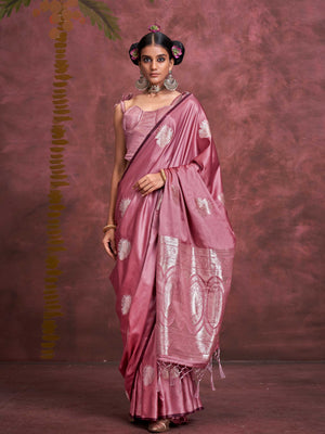 Blush Rose–Silver Mauve satin silk saree with intricate jacquard zari motifs and metallic pallu, styled for wedding reception and festive bridal evenings with sculpted blouse elegance. Blush Rose–Silver Mauve satin silk saree with intricate jacquard zari motifs and metallic pallu, styled for wedding reception and festive bridal evenings with sculpted blouse elegance..