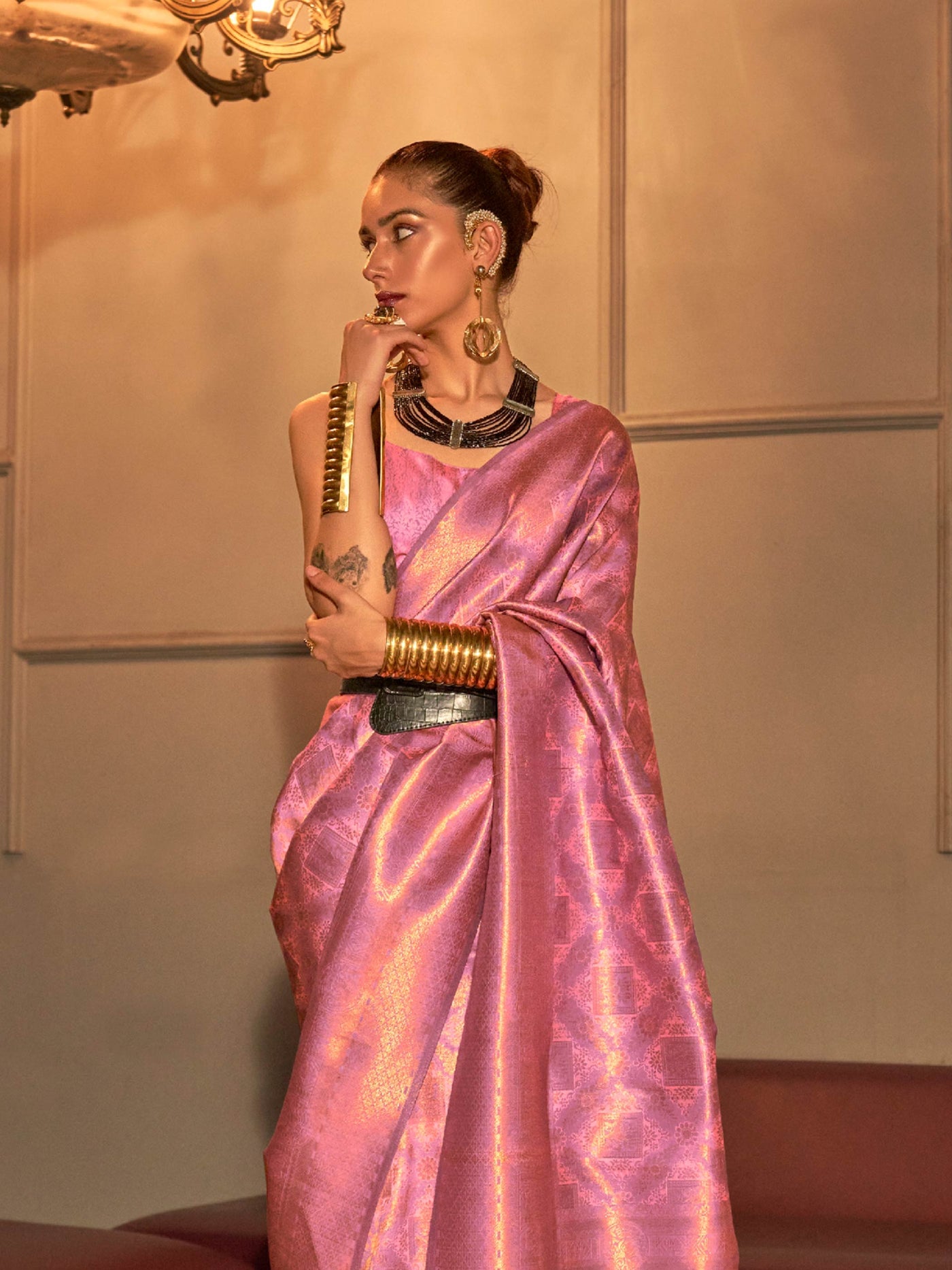 Dual-tone Blush Pink–Coral kanjivaram silk drape with woven pallu and soft shimmer effect. Elegant silk saree in Blush Pink–Coral for bridal wear, featuring zari pallu and contemporary design.