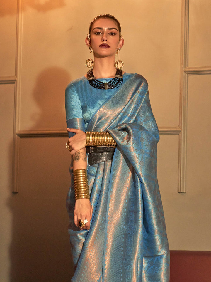 Dual-tone Icy Blue–Silver kanjivaram silk drape with woven pallu and soft shimmer effect. Elegant silk saree in Icy Blue–Silver for bridal wear, featuring zari pallu and contemporary design.