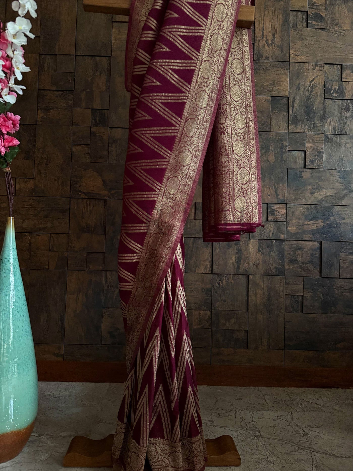 Wine maroon ethnic saree with ornate golden pallu and zari border