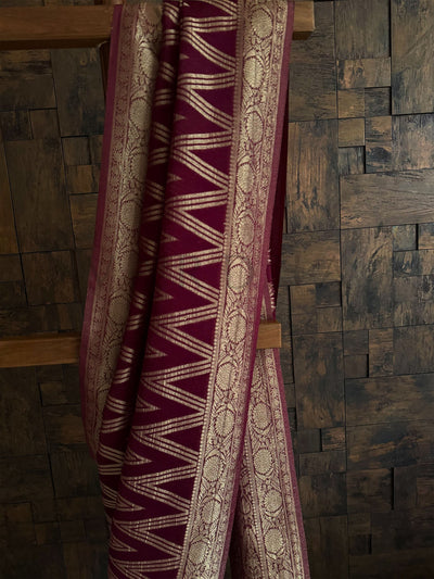 Zari rich saree in wine tone with geometric motifs and smooth drape