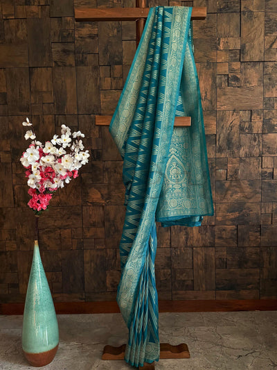Teal blue soft georgette saree with mint gold woven zari pallu