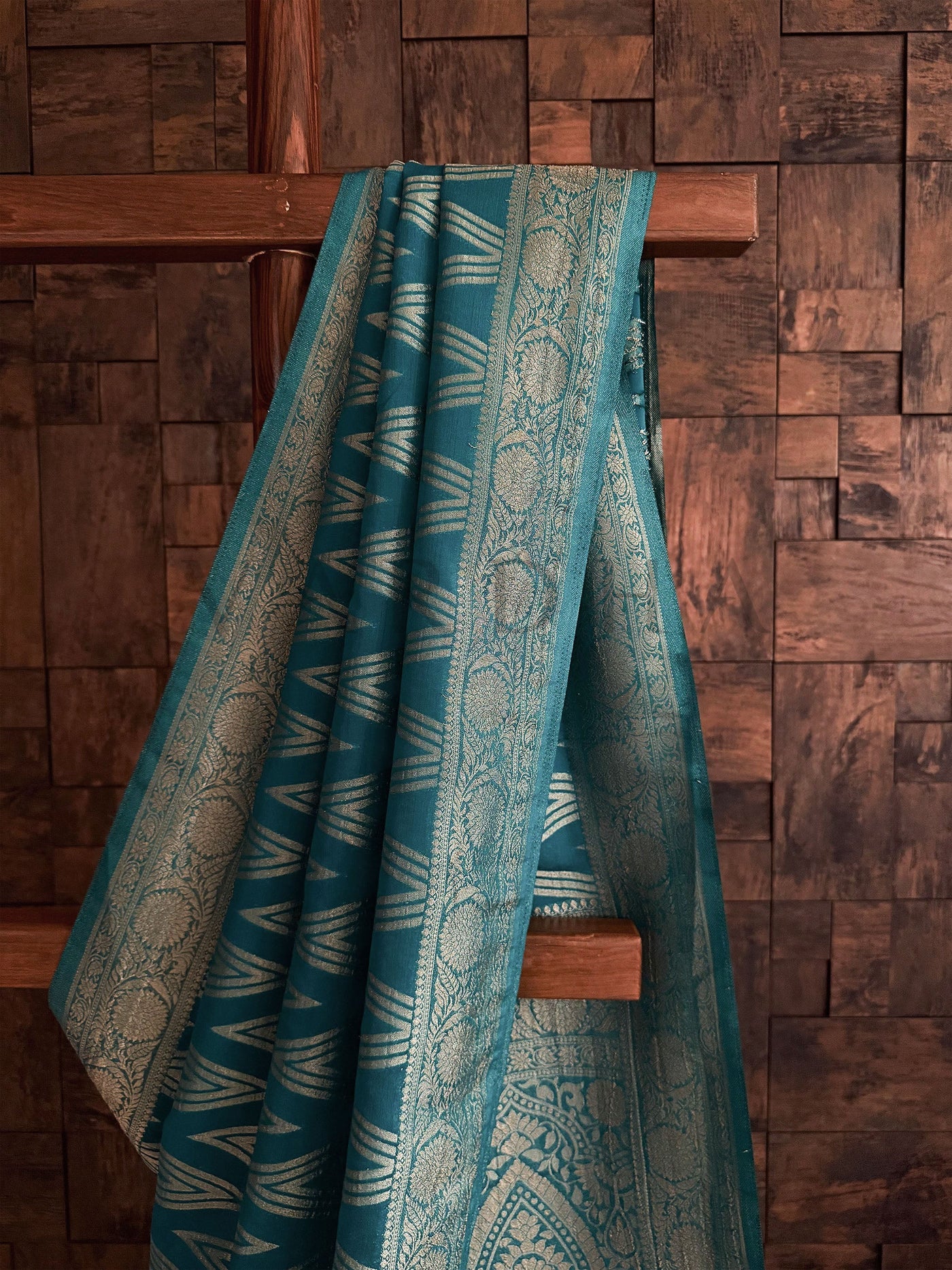 Saree for reception with rich zari border and soft drape