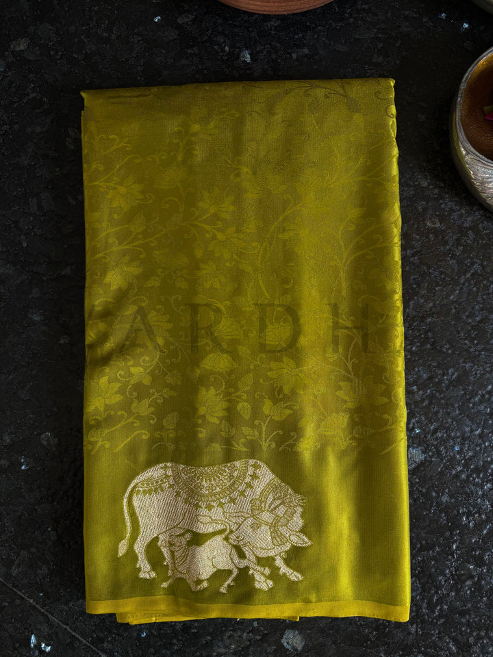 Soft satin green saree ideal for cultural and devotional occasions