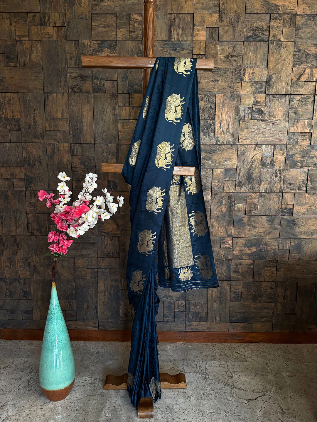 Midnight blue satin saree with antique gold woven elephant and floral motifs